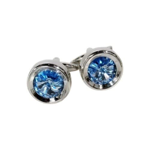 AryA Gioielli | Altarocca gemelli uomo tondi con cristallo Swarovski azzurro - 216AB - su sfondo bianco